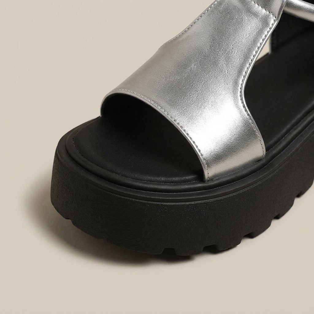 Marlee silver metallic T-strap platform sandals, close-up of the material